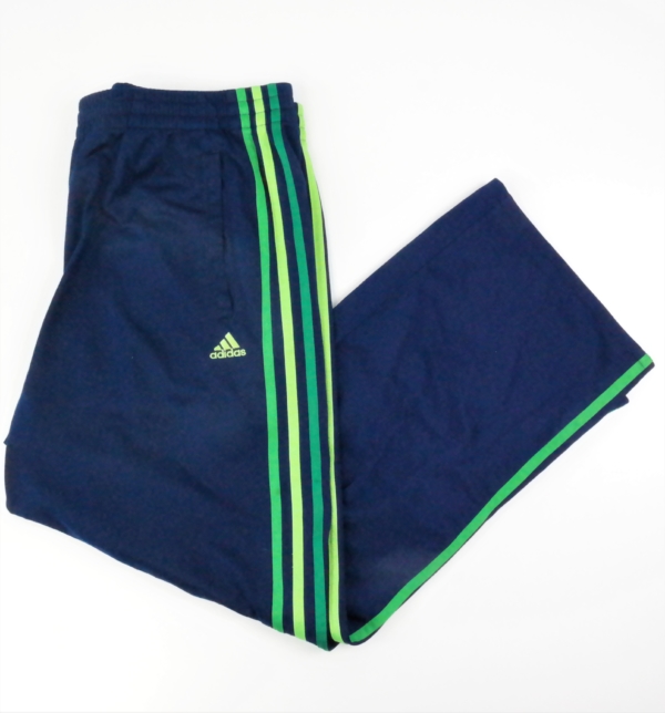 blue sports trousers with green stripes